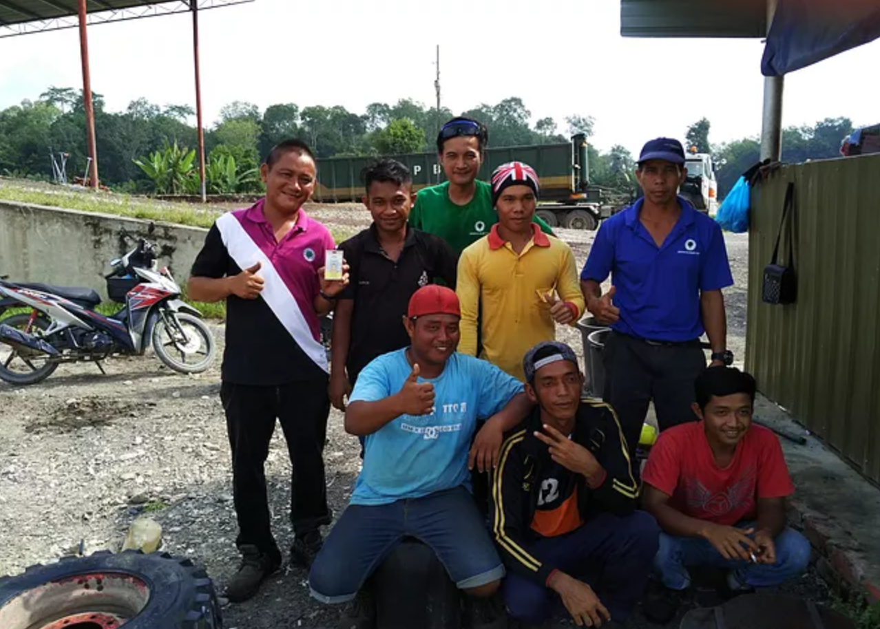 Workers at Sarawak oil palm bhd's Tinbarap mill
